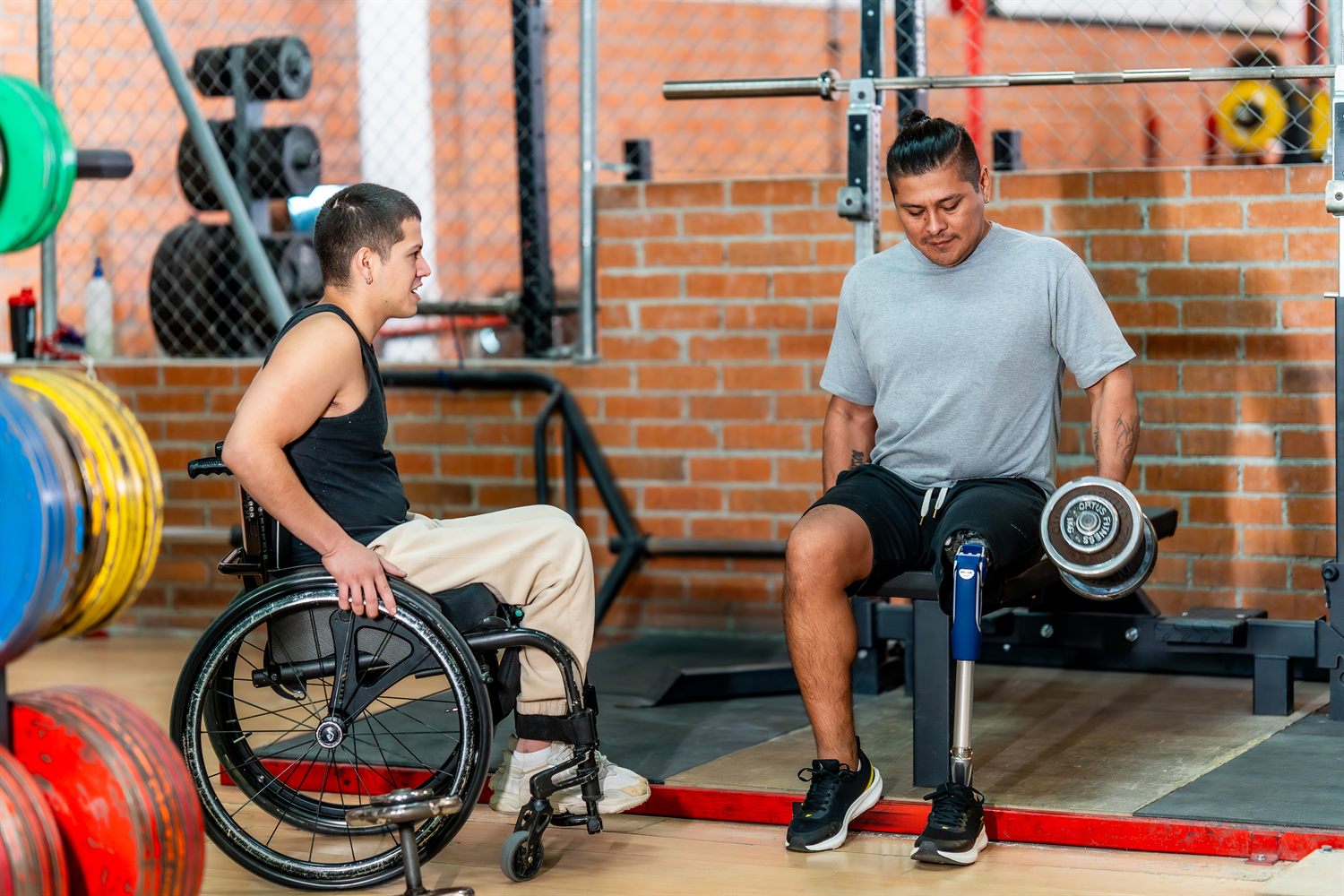 Adaptive athletes training together in an inclusive gym